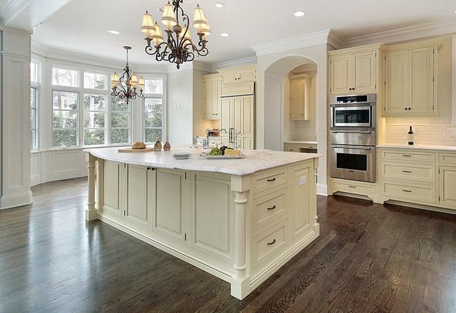 wood-look laminate flooring in bright, airy kitchen in Crowley TX